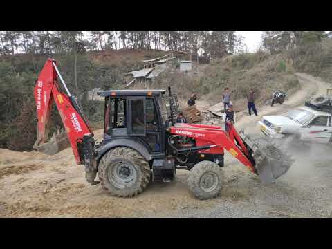 Manitou Terrex Backhoe Loader Loading Crushed Stone | 4K
