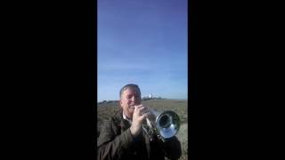 Keith Twyman, English Cornet Player, Sunrise Outside Playing to the English Channel
