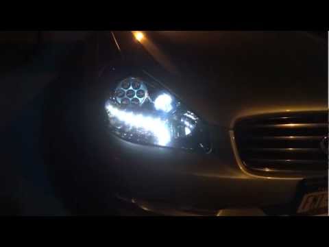 Infiniti Q45 custom LED headlights and OEM projectors output