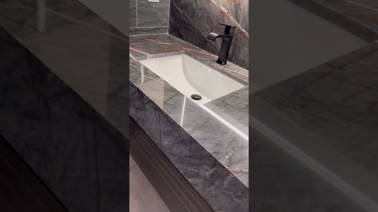 Quartzite Bathroom Countertop and Backsplash.     #countertop #remodeling #renovation #seattle