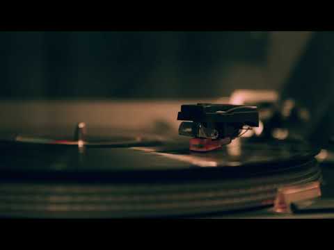 Playing A Vinyl Record On A Spinning Turntable - 4K HD Video