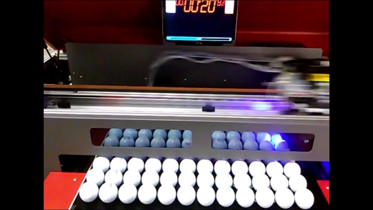 Impression de balles de golf en UV Beled