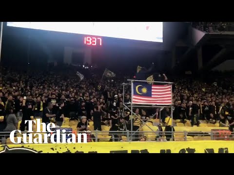 Malaysia fans perform collective chants before game with Indonesia