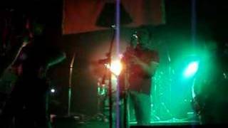 Videoklip UDG - Nečitelný policejní román (live) s textom piesne