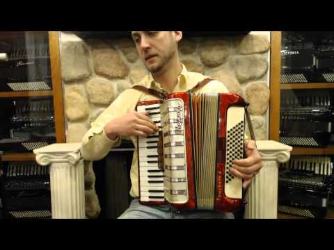 1555 - Red Gold Hohner Concerto III LMM 72 $995