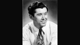 Roy Acuff - We Planted Roses On Our Darling's Grave (1944).