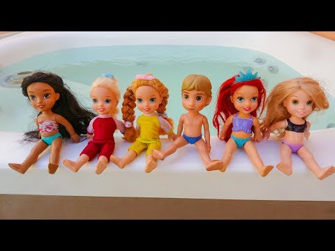 Elsa and Anna toddlers pool party and challenges