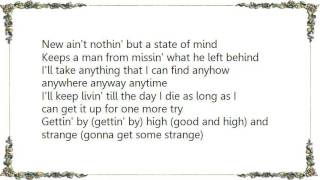 Kris Kristofferson - Getting By High and Strange Lyrics