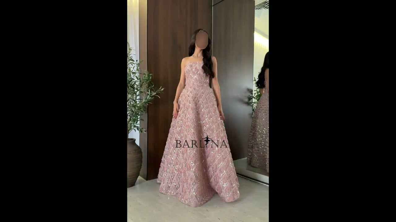 Pink evening dress with shiny embroidery and a geometric pattern - XXL