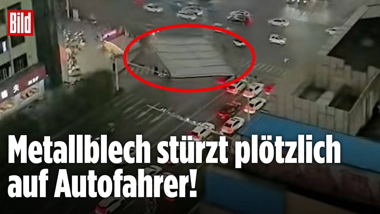 CHINA: Sturm-Drama an der Kreuzung: Plötzlich stürzt Metallblech auf wartende Autos!
