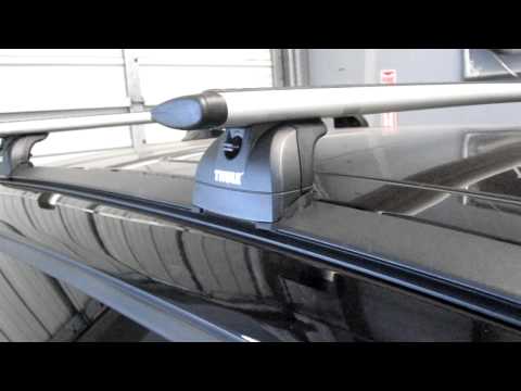 Volvo XC60 with Thule 460R Podium AeroBlade Roof Rack by Rack Outfitters