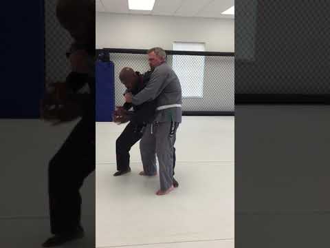 Brazilian Jiu-Jitsu self-defense against bear hug from behind