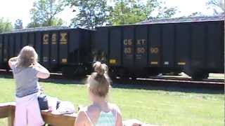 Folkston GA Girls waving to Csx  engineer during Railwatch 2013