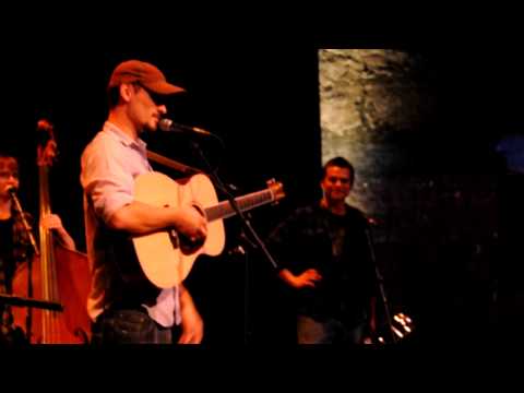 The Gentle Guest banters between songs