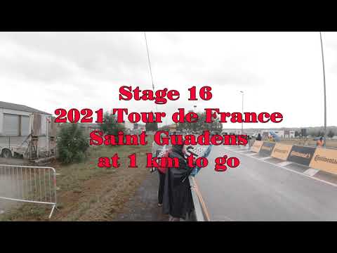 Stage 16 Tour de France at 1km to go banner 13 July 2021 Saint Gaudens