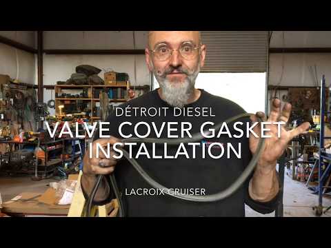 Valve cover gasket installation on a Detroit diesel.