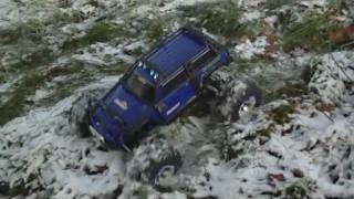 preview picture of video 'traxxas summit + slash 4x4 snow bashing jumps bmx track 2010'