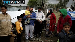Turkish aid groups work to keep refugees warm