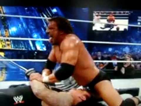 HHH uses Undertakers special Tombstone piledriver