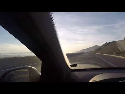 Driving on the highway on the coast of Aegean Sea in Greece near Kavala