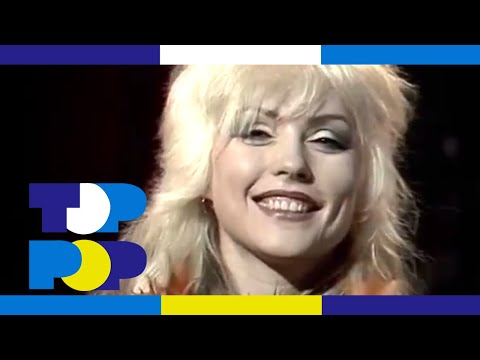 Toppop’s Ad Visser congratulates Debbie Harry of Blondie with their number 1 hit ‘Denis' in Holland.