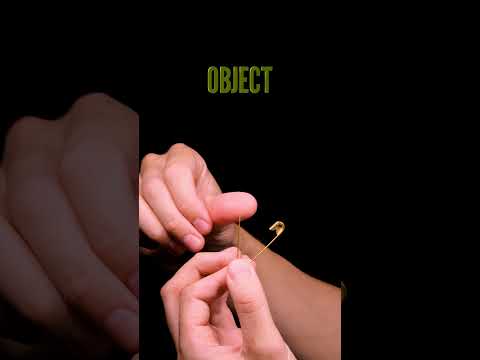 Finger and Needle Close Up