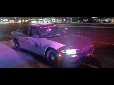 Cop spills alcohol on herself then proceeds to litter,driver let go AFTER he removes tag f#@k all 🐷s