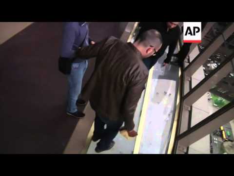 A new $38 million glass floor, located high above ground, is giving tourists at the Eiffel Tower but