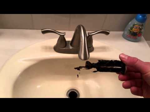 Bathroom Sink quick fix: How to remove and clean the Stopper - unclog sink - pop up Drain Video