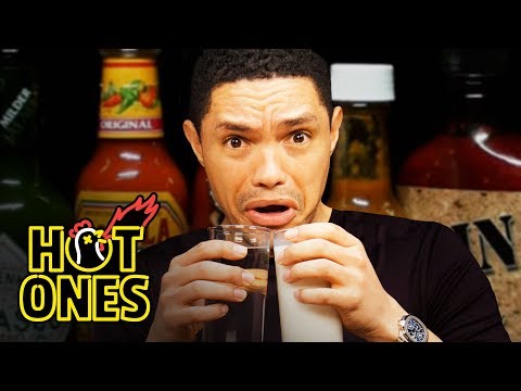 Trevor Noah Rides a Pain Rollercoaster While Eating Spicy Wings | Hot Ones Video