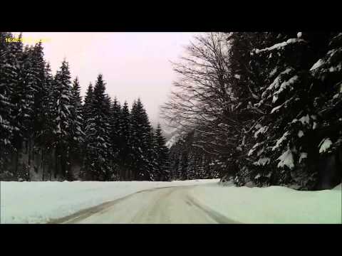 Driving through a winter wonderland on DN 66 A, Romania