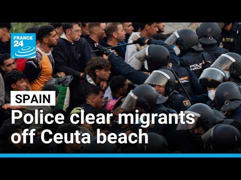 Spain's police launch operation to clear migrants off Ceuta beach
