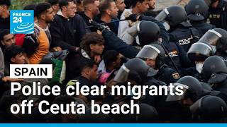 Spain's police launch operation to clear migrants off Ceuta beach • FRANCE 24 English