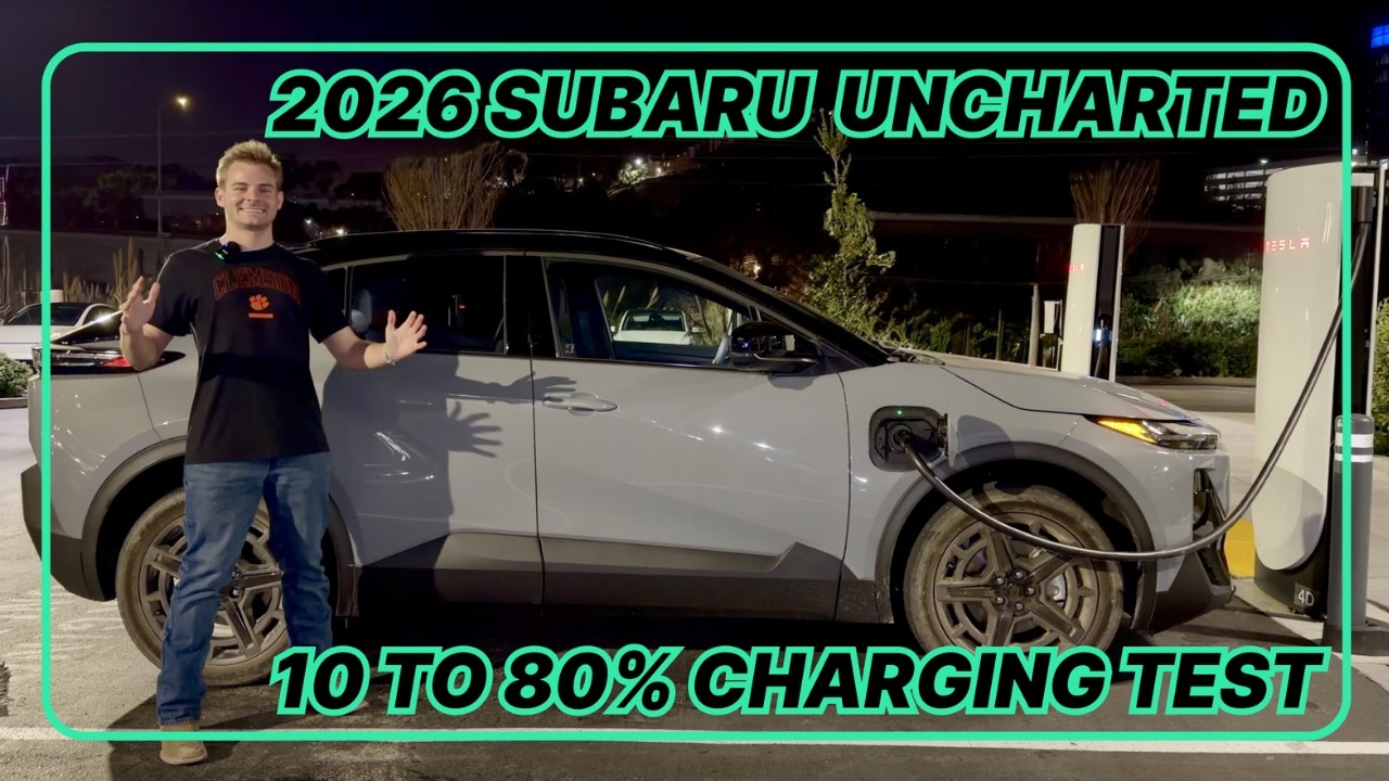 2026 Subaru Uncharted electric crossover on a DC fast charger at night in South San Francisco