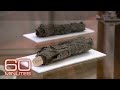 Deciphering the ancient scrolls of Herculaneum | 60 Minutes Archive