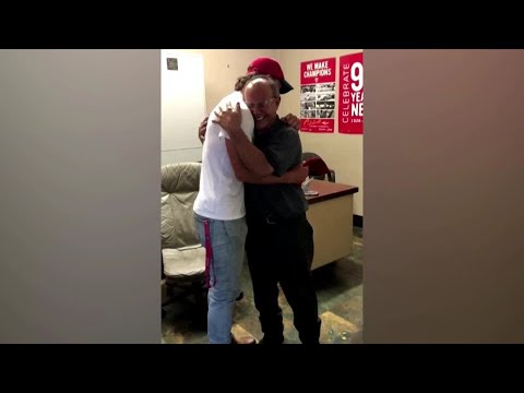 Newly-signed baseball player Robert Anthony Cruz surprises dad at work