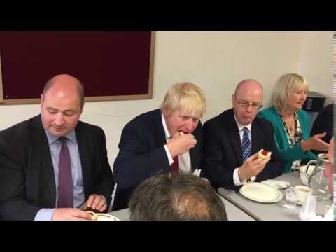 Boris Johnson eating a scone in Chulmleigh.