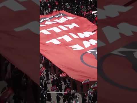 Crowds in Mashhad hold 'We will kill Trump' banner ahead of Khamenei burial