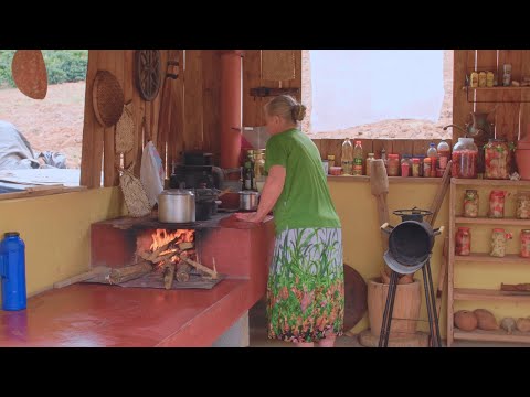 Cooking a Traditional Lunch on a Wood Stove in the Countryside
