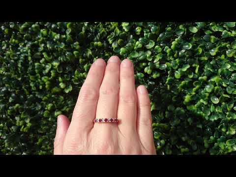 A ruby and diamond eternity ring