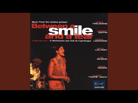 Between A Smile And A Tear