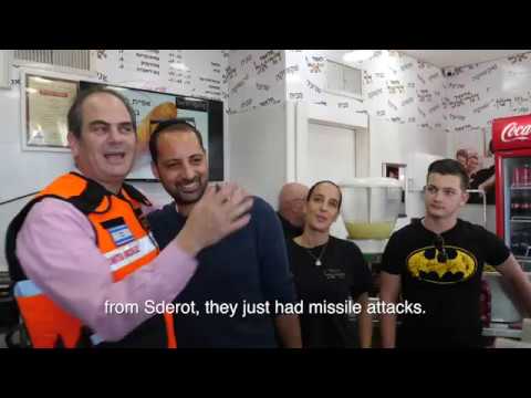 Eli Beer Serving Falafel To Help The Store of an EMT Injured In The Line of Duty