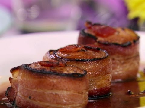 deer meat wrapped in bacon, stuffed with whipped Cream cheese, diced Peppers and sausage.