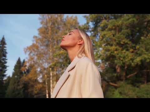 Female Legs On A Sandy Beach