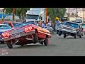Lowriders Cruising 3 Wheel Motion in Los Angeles