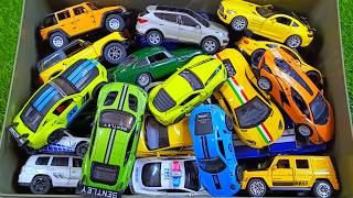 I will take out many mini police cars from the box to have a race!