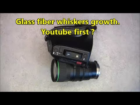Glass fiber whiskers on a broadcast zoom lens