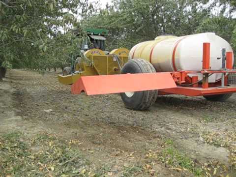 Berm Blaster and Spray Rig Entering Orchard
