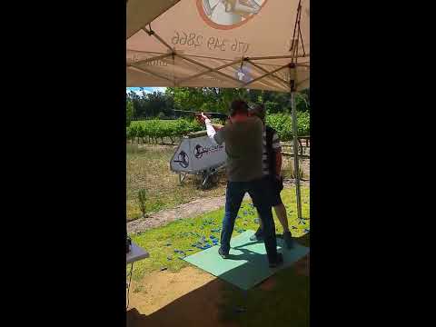 Clay pigeon shooting with pump action shotgun