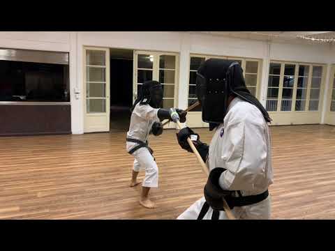 Bojutsu practice with protective gear